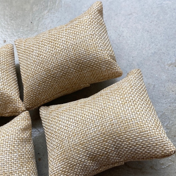Four tan jute look miniature pillows. 3 inch by 2 inches rectangles. - Picture 3 of 6